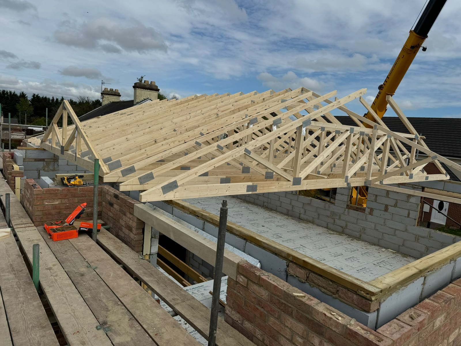 Roof trusses being craned in