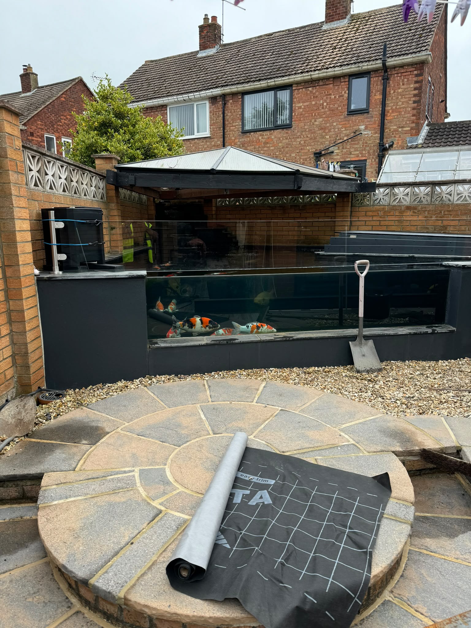 Glass sided koi pond