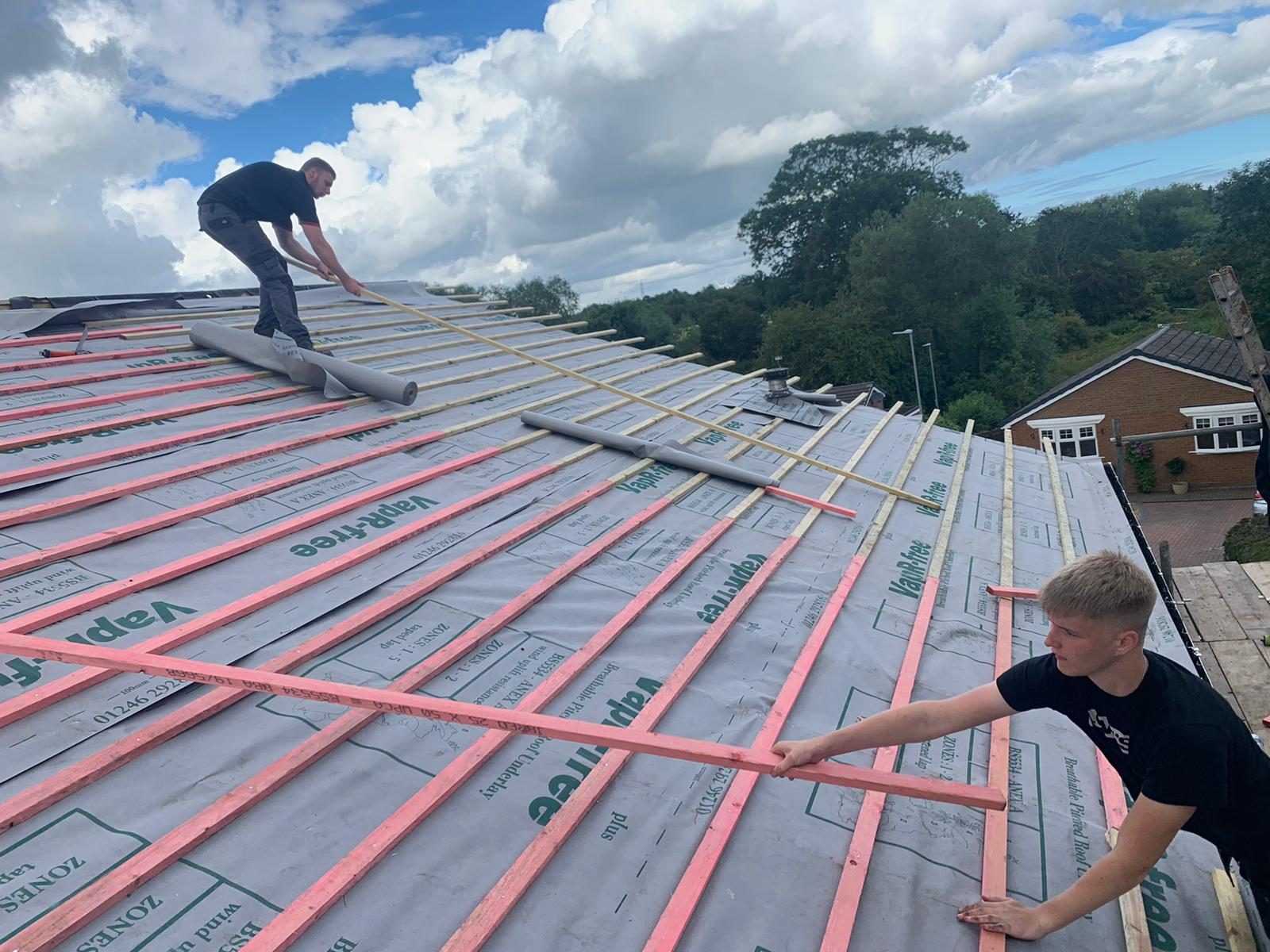 New roof fitters at work